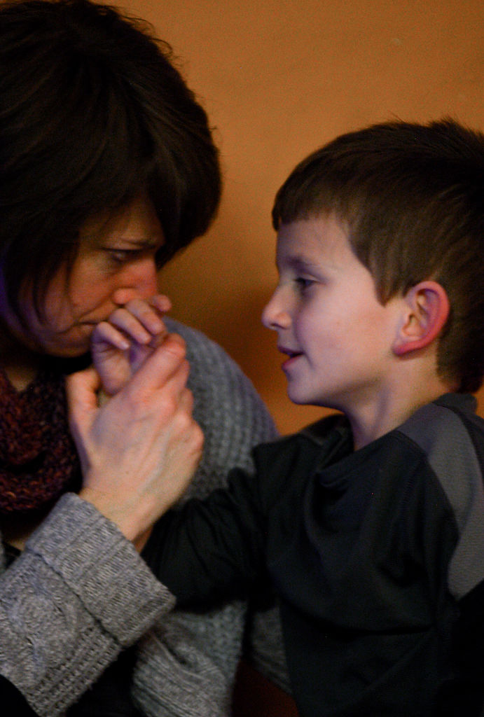 Holly Grantham kisses her son